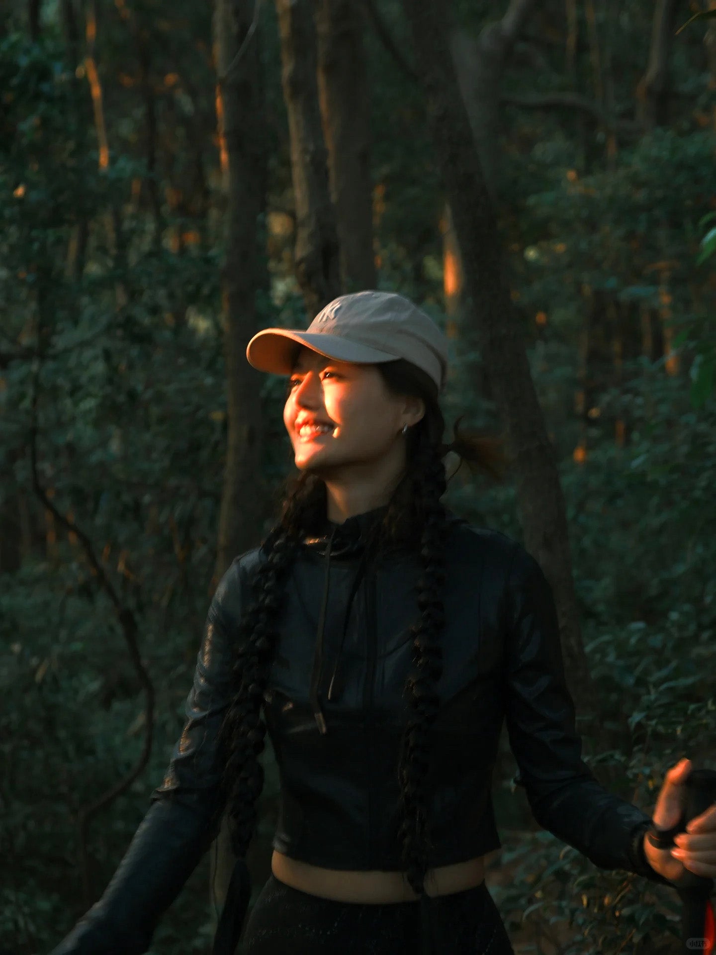 Woman wearing ROSEBIBI Faux Leather Shiny Short Jacket from the Wild and Free petite activewear collection while hiking