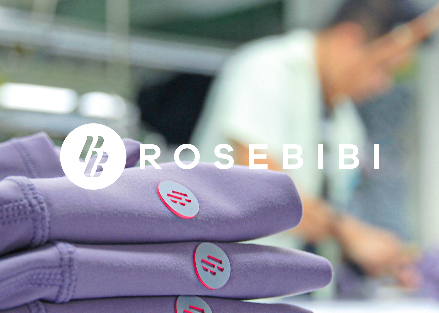 Detailed production process in the factory for ROSEBIBI petite activewear collections, showcasing the ROSEBIBI logo